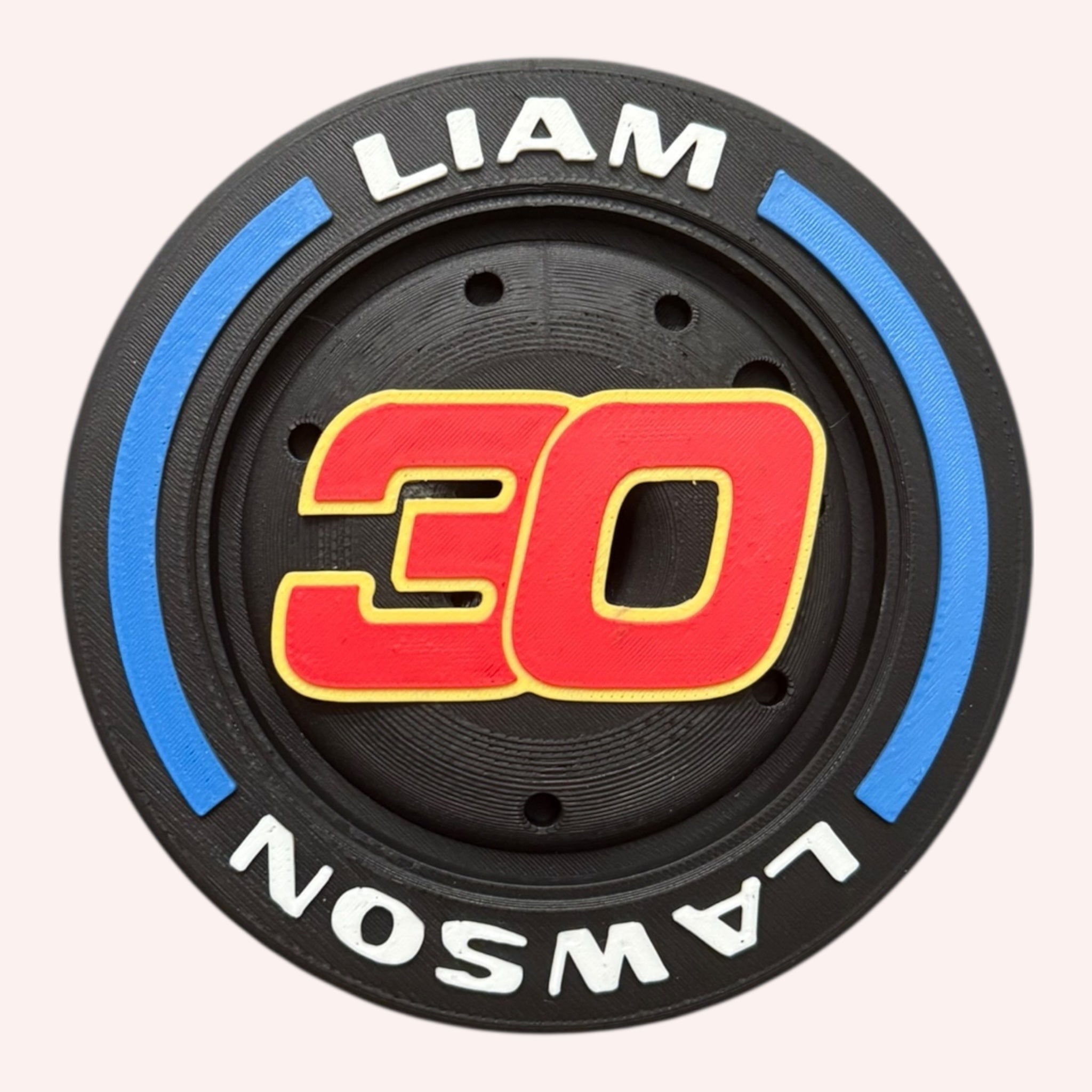 Liam Lawson F1 Tire Display