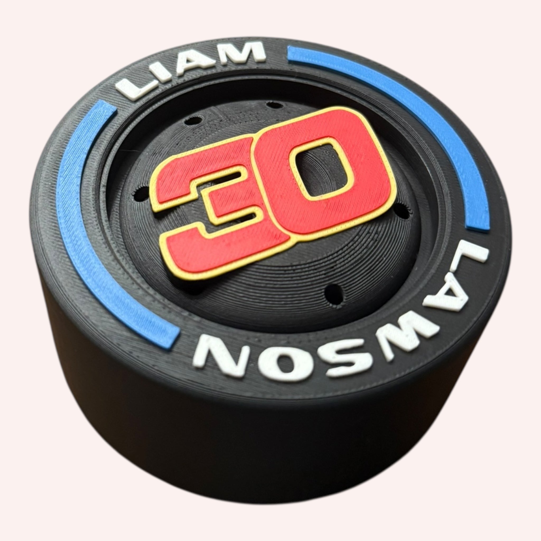 Liam Lawson F1 Tire Display