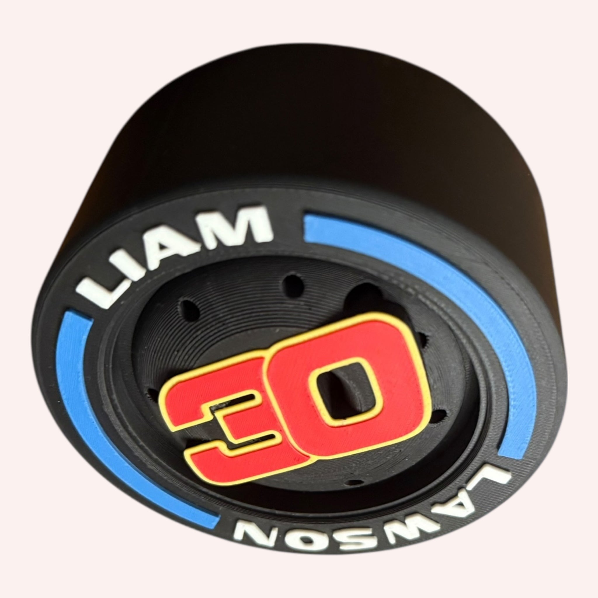 Liam Lawson F1 Tire Display