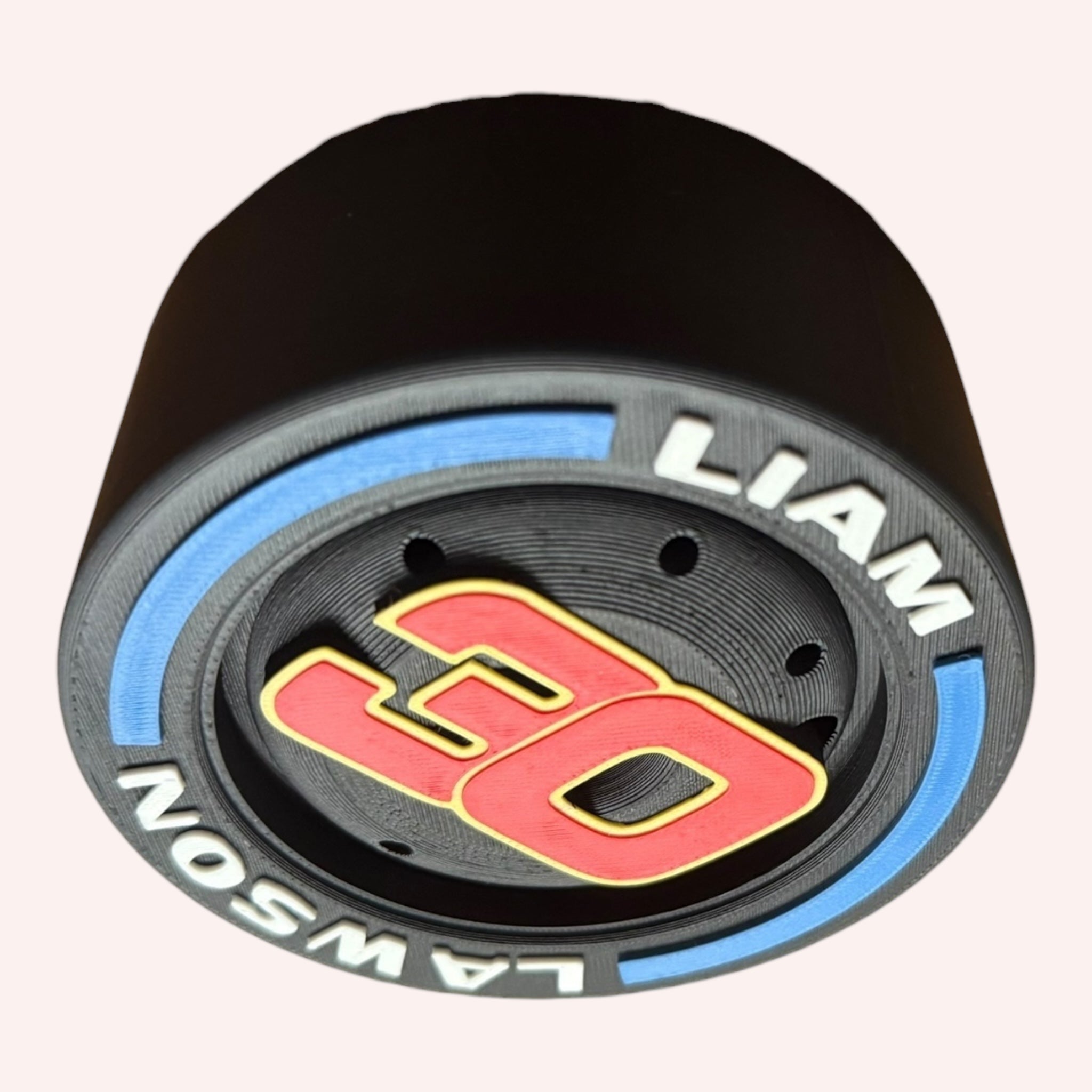 Liam Lawson F1 Tire Display